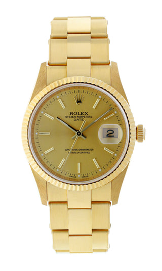 Gold Rolex watch.